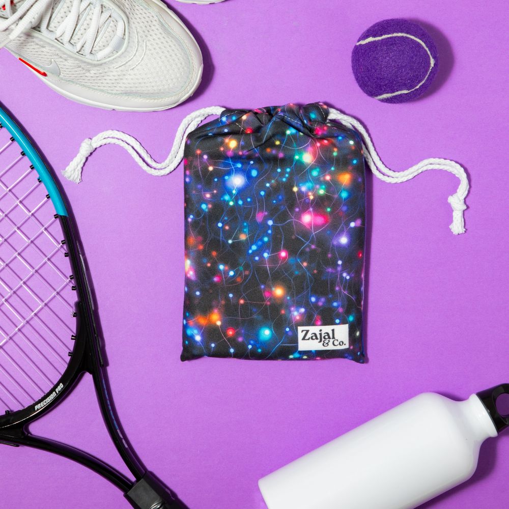 galaxy_towel_bag_flatlay_with_water_bottle_and_gear