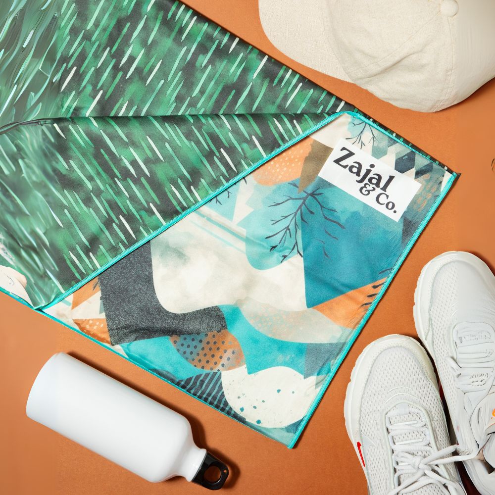 gym_flatlay_with_mountain_print_bench_cover_and_accessories