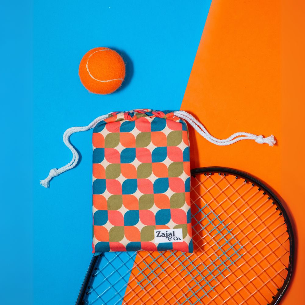 patterned_gym_pouch_with_orange_background_and_tennis_racket