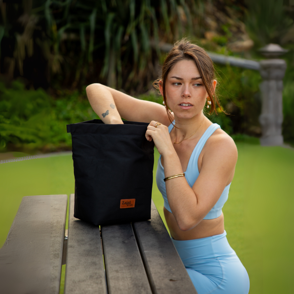 seated_model_with_black_office_lunch_bag