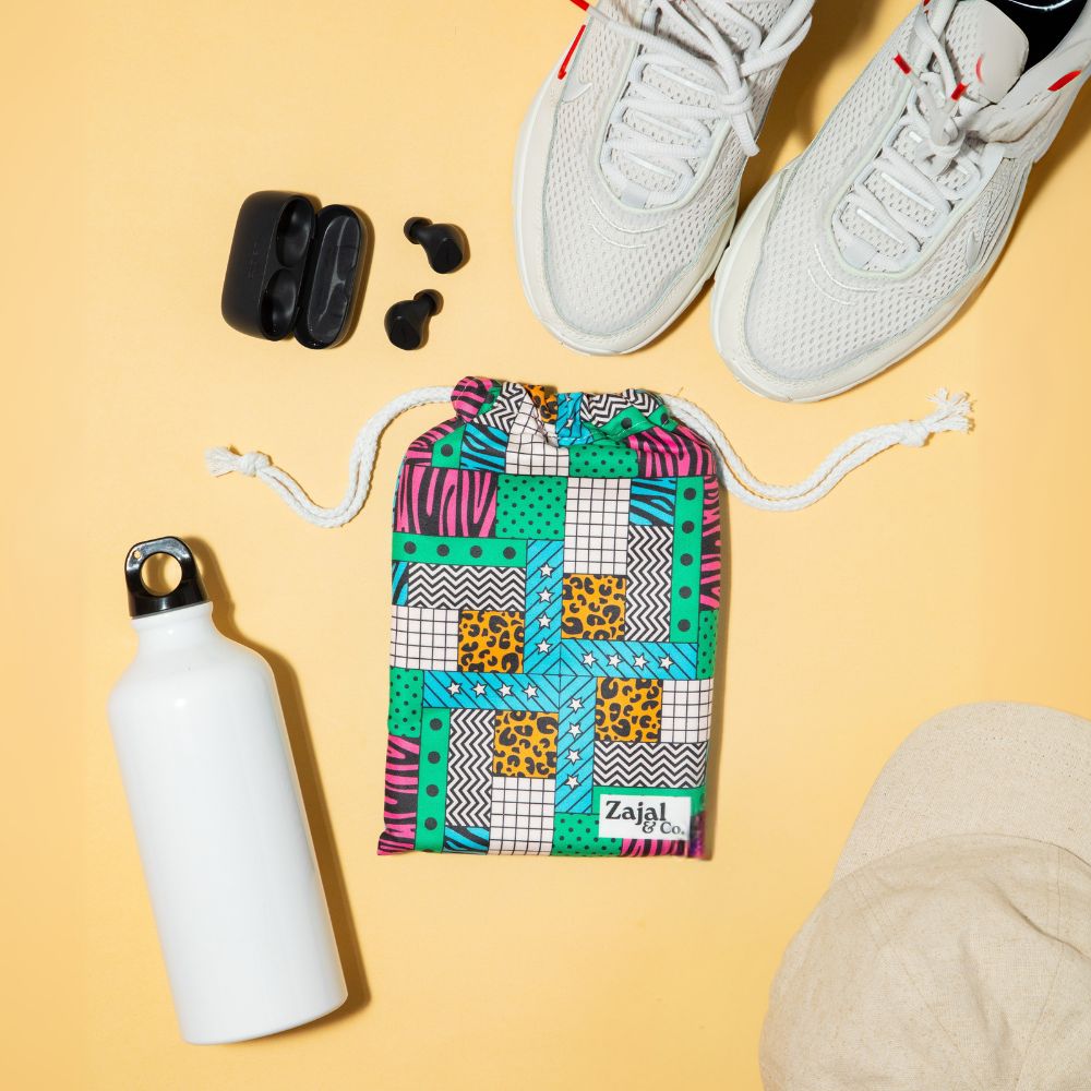 womens_gym_towel_flatlay_with_bottle_and_shoes